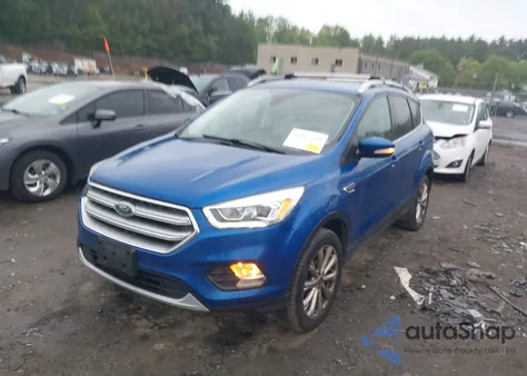 2017 Ford Escape Titanium from USA, damaged, VIN 1FMCU9J96HUA44409